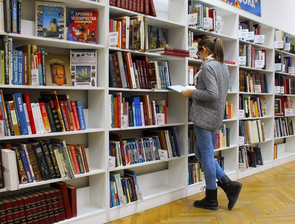How is technology transforming traditional library services?